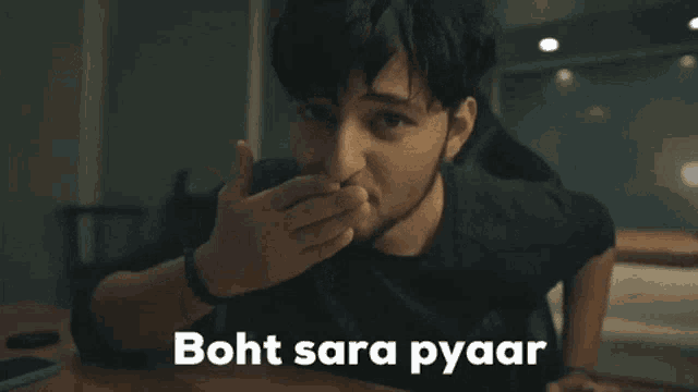 a man giving a thumbs up with the words boht sara pyaar behind him
