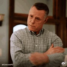 arms crossed hank voight chicago pd angry mad