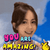 a picture of a girl with the words " you are amazing " on it