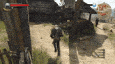 a video game is being played and a man is walking towards a house