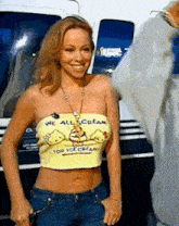 a woman in a crop top that says we all cream for ice cream