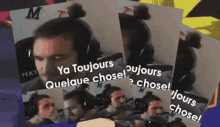 a man wearing headphones has a bun on his head and says ya toujours
