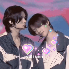 a couple of men standing next to each other with hearts on them .