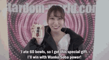 a woman is holding a sign that says ' i ate 60 bowls so i got this special gift '