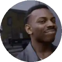 a man with a mustache is smiling in a circle