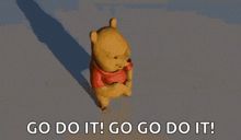 winnie the pooh is dancing and saying `` go do it ! go do it ! ''