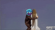a man in a leather jacket is flying through the air with a rocket behind him and the word brett on the bottom
