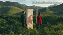 a man and a girl are standing in front of a door that says #abigbold beautiful journey