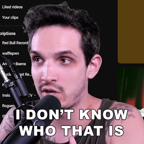 a man speaking into a microphone with the words 