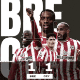 a group of soccer players wearing red and white striped shirts with hollywood bets written on them
