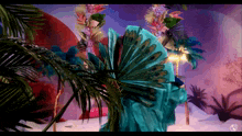 a woman in a peacock costume holds a fan in her hand