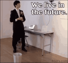 We Live In The Future GIF - Future Automatic Trashcan GIFs