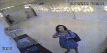 Security Camera Lady GIF - Security Camera Lady Standing GIFs