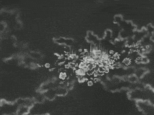 a black and white drawing of a castle with flowers and stars