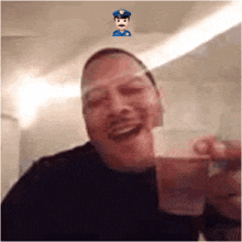a man in a police hat is holding a glass of liquid