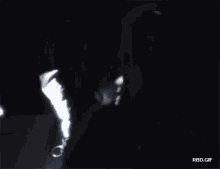a black and white photo of a woman and a man with rbd.gif written on the bottom