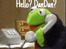 kermit the frog is talking on a telephone and says hello dan dan