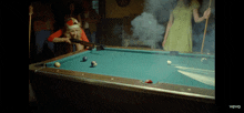 a pool table with the word vevo on it