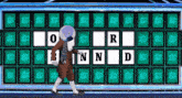a man in a suit and tie is walking in front of a wheel of fortune board