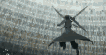 a man is flying through the air with a sword in his hand .