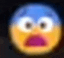 a blurry picture of a cartoon smiley face with a surprised expression .