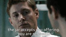 a man talking to another man with the words the jar accepts you offering you are released