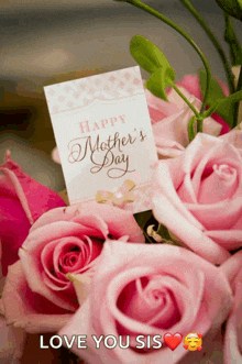 a bouquet of pink roses with a card that says happy mother 's day on it