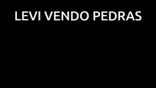 a close up of a girl 's face with the words levi vendo pedras below her