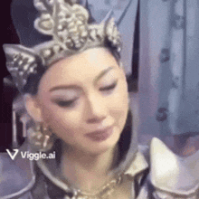a woman in a costume with a crown on her head .