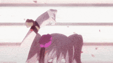 a girl with a pink flower in her hair is dancing