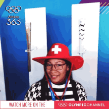 posing smiling selfie olympic torch switzerland hat