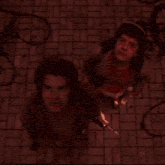 a dark room with a red light shining through it