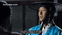 a man wearing a hat and a blue shirt says if you don t believe in yourself