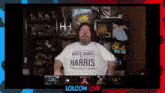 a man is wearing a white shirt that says harris