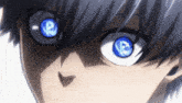 a close up of a person 's face with a blue eye