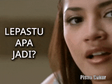 a close up of a woman 's face with the words lepastu apa jadi written above her