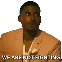 a man in a pink suit has the words we are not fighting below him