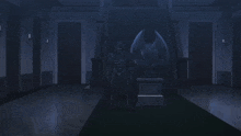 a skeleton wearing a hooded cloak with a skull on his face