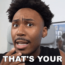a man with a surprised look on his face and the words that 's your below him