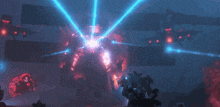 a group of robots are standing in front of a wall with red lights on it