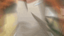 a blurry picture of a knife cutting a piece of paper