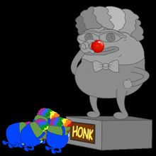 a statue of a clown with a red nose stands next to a sign that says honk