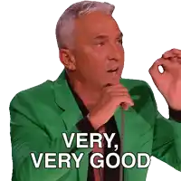 a man in a green suit says very good