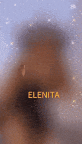 a blurred image of a woman with the name elenita