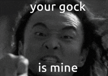a black and white photo of a man with the words your gock is mine above him
