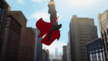 a man in a red cape is hanging from a pole with a sign that says ' big man ' on it