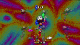 a video game screen shows a colorful background and the words la la la la la la