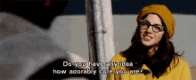 a woman wearing glasses and a yellow hat says do you have any idea how adorable you are