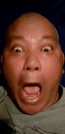 a man making a funny face with his tongue out