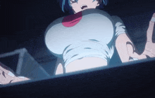 a close up of a girl 's breasts in a white shirt
